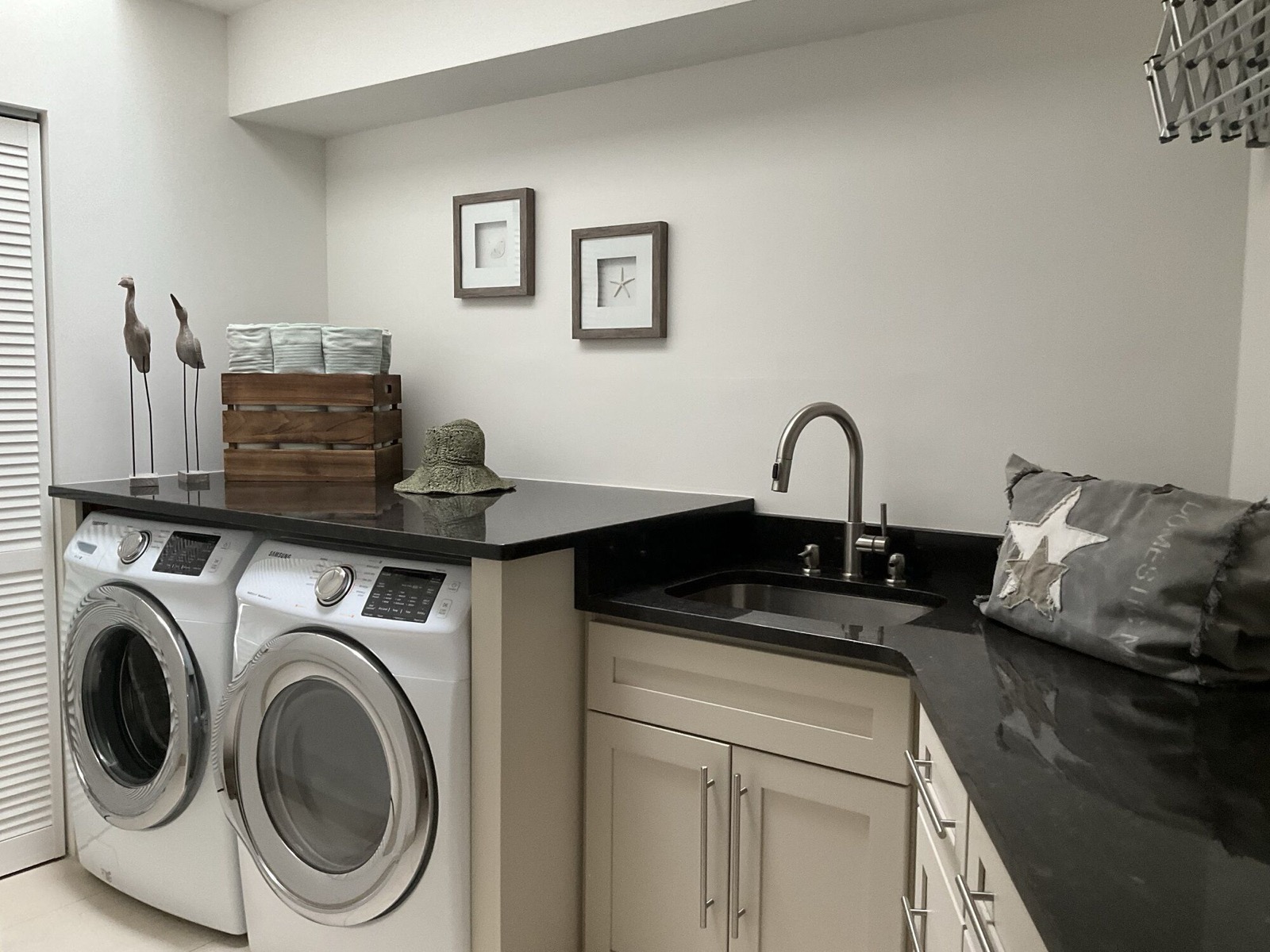 Laundry room with washing machine and dryer