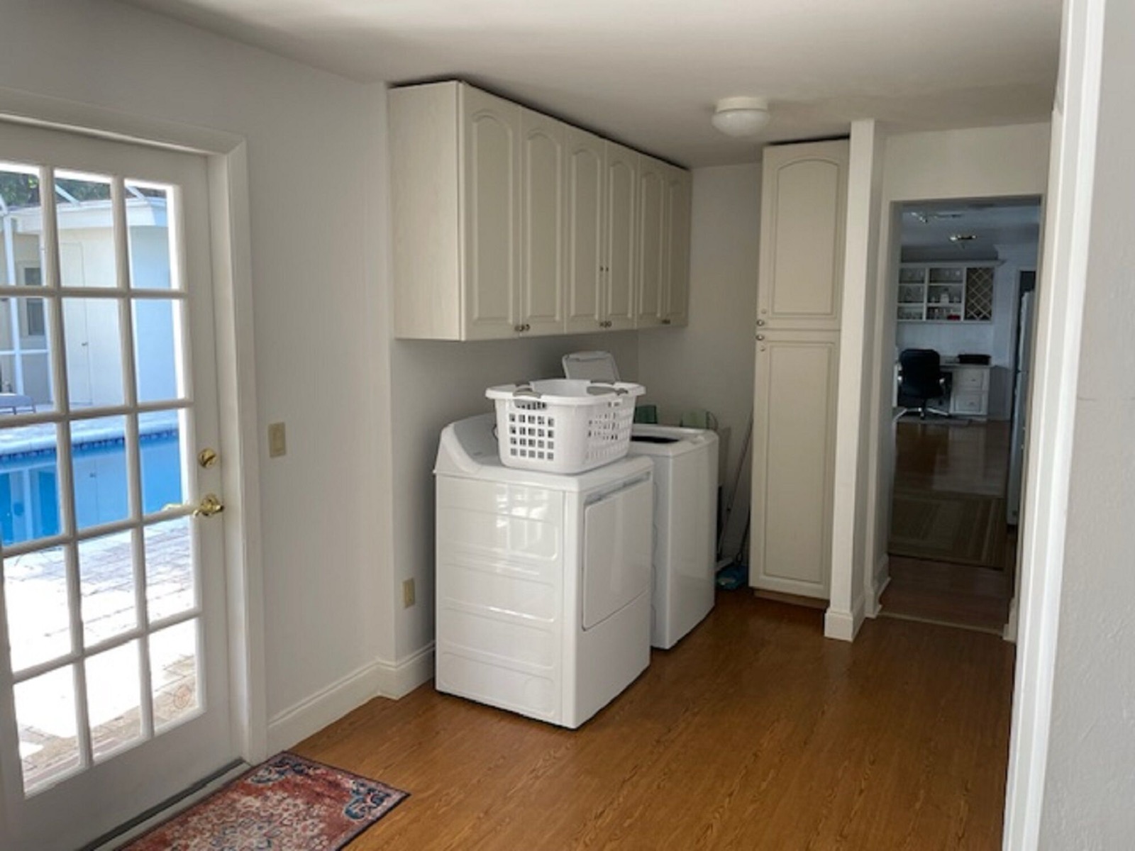 Laundry room with washing machine and dryer