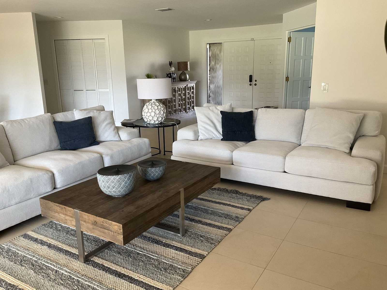 Bright living room with light sofa and coffee table